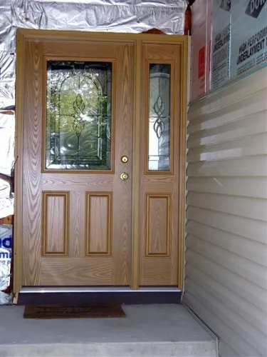 Entry door installation in progress on an Elmhurst, Illinois home, overseen by Durabuilt ownership
